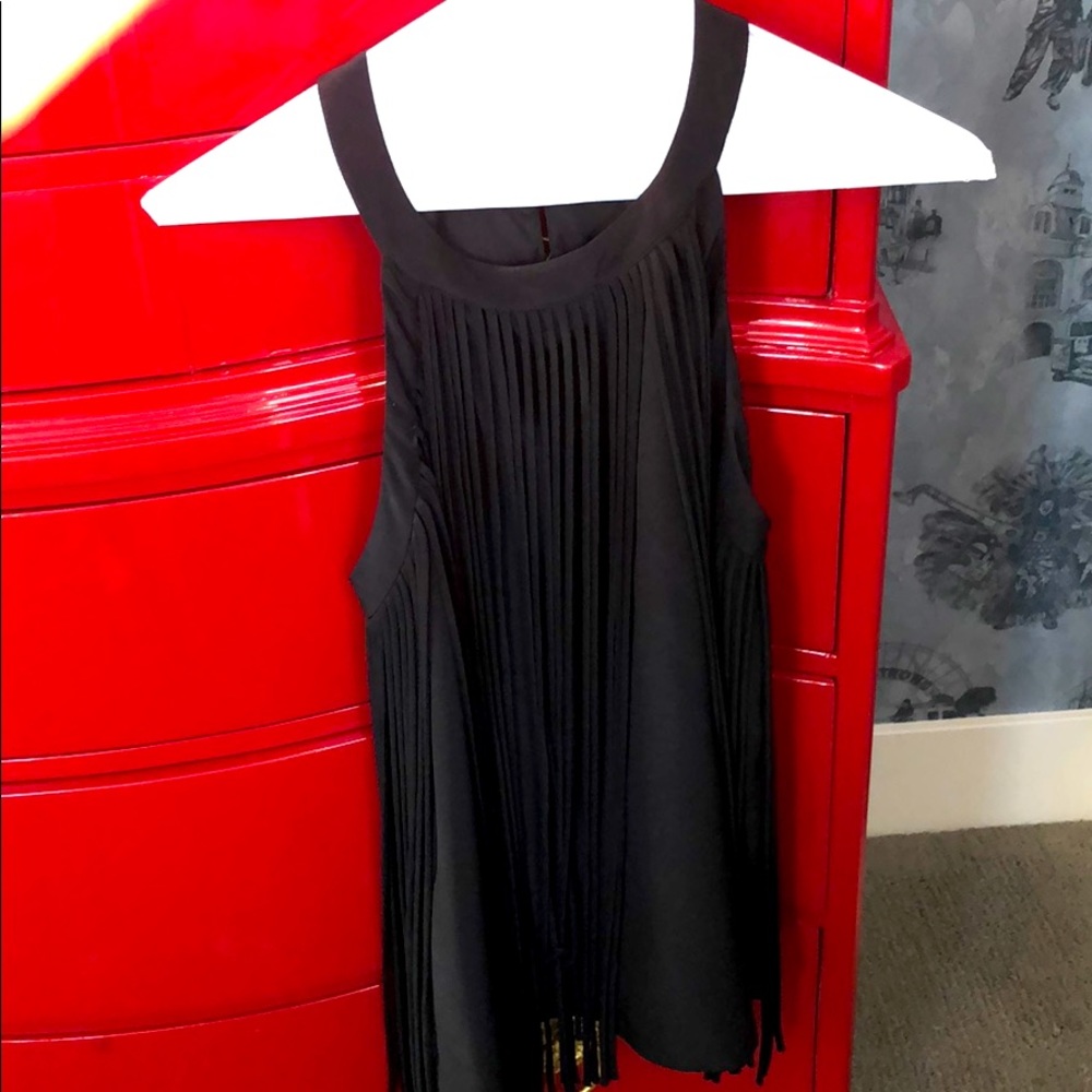 Sleeveless black tank with fringe